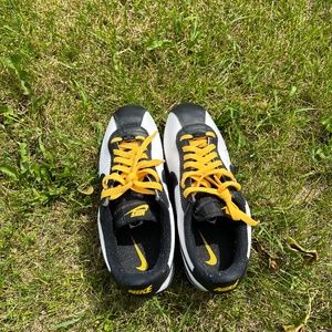 Nike Cortez, men's size 7, black, white, and light orange.